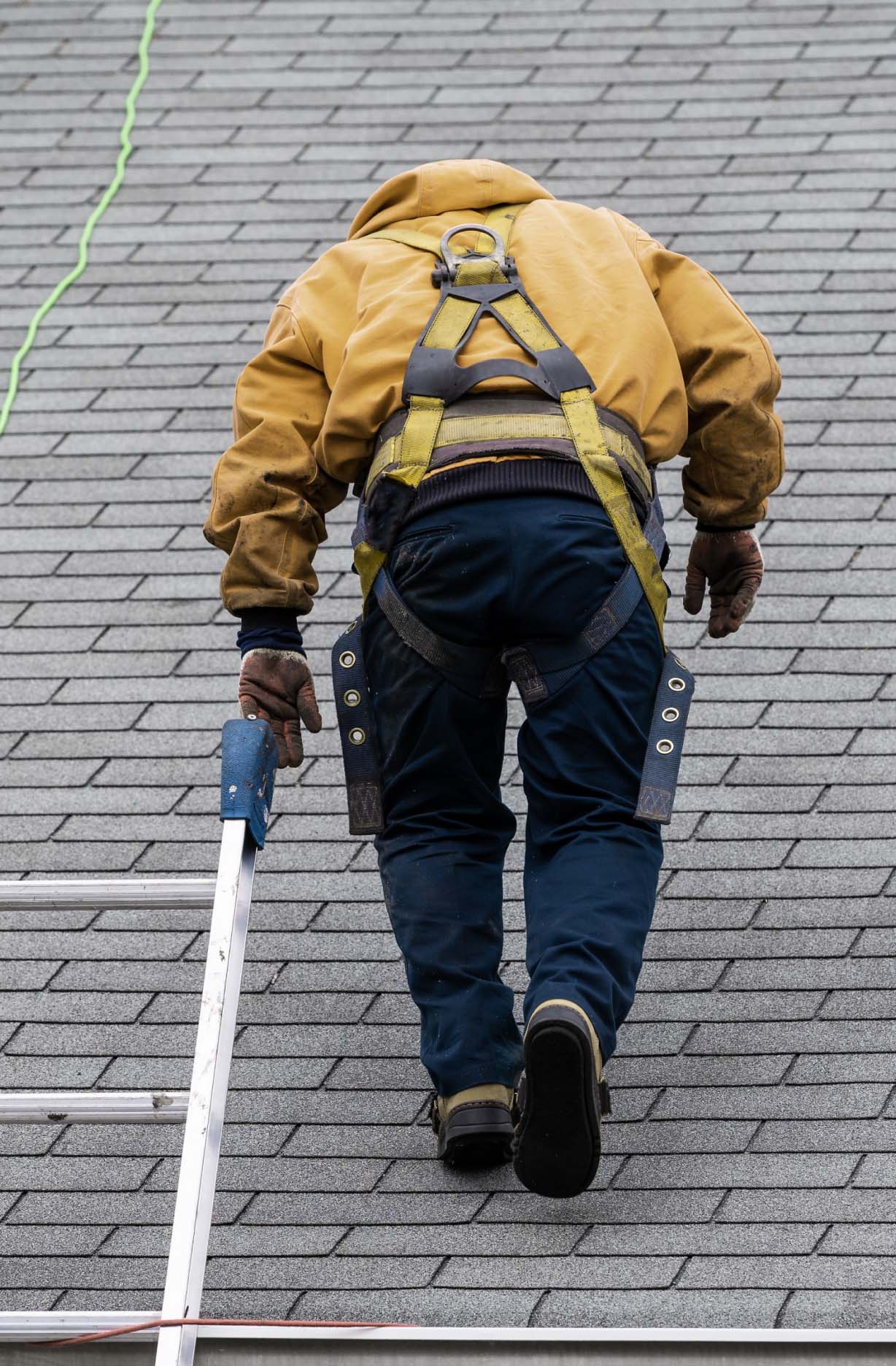 man on a roof image